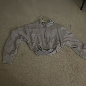 Light grey, small, zip up.